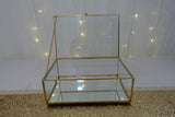 Gold framed rectangular glass box