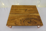 Wooden rectangular board with rose gold stands