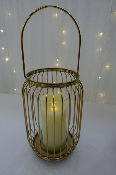 Gold cylindrical candle holder