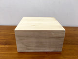 Small light wooden square crate