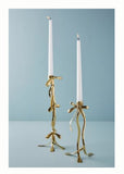 Gold ribbon candle stand