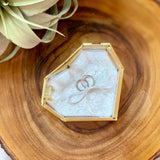 Gold heart shaped ring box