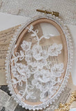 Oval lace frame