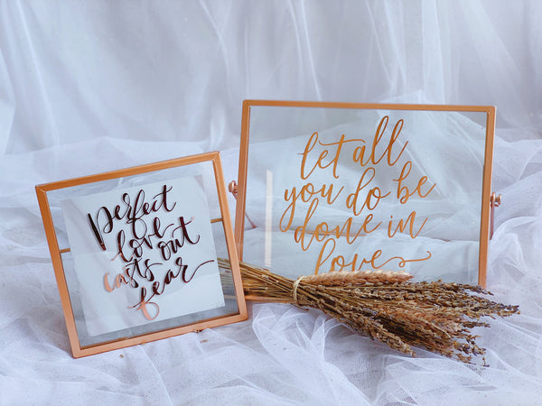 Rose gold frames with love quote
