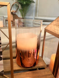 Rose gold cylindrical candle holders
